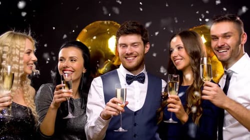 Smiling Friends Toast Champagne at Elegant Celebration