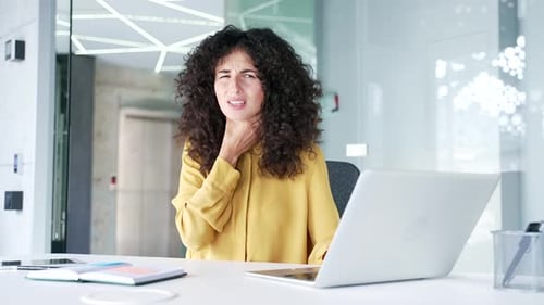Woman in Office with Sore Throat