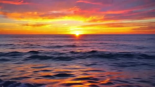 Sunset Over Ocean Waves with Vibrant Orange and Purple Sky D