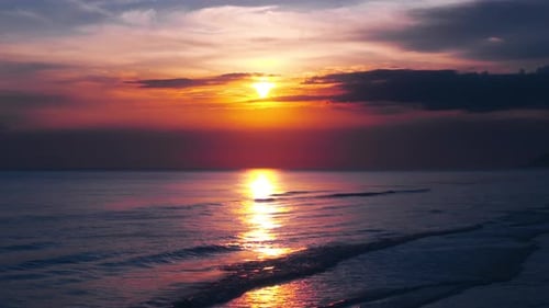 Sunset Reflections Over the Ocean Waves