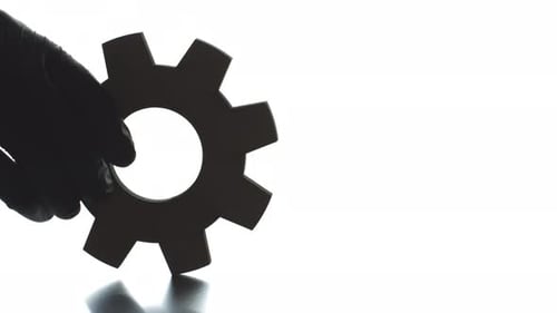 Rotating Cog With Performance Graphic