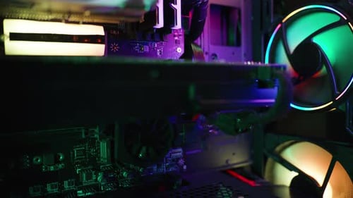 Inside Computer Tower with Glowing Electronic Parts