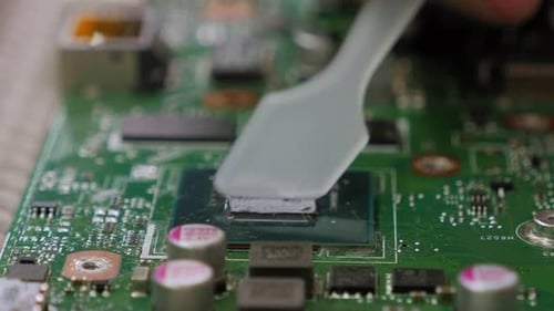 Applying Thermal Paste to the Laptop Processor