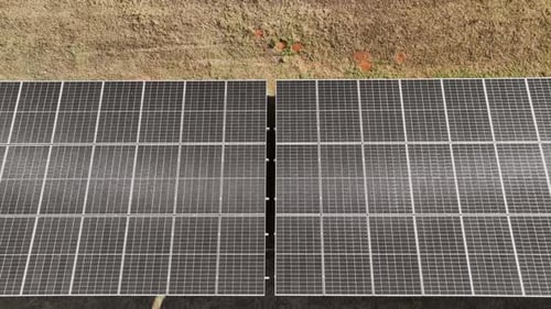 Aerial View of Solar Panels in Rural Setting