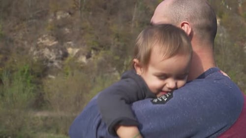 Loving Father Bonding With Child Outdoors