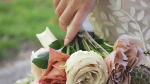 Close Up of Bridal Bouquet with Pink Roses