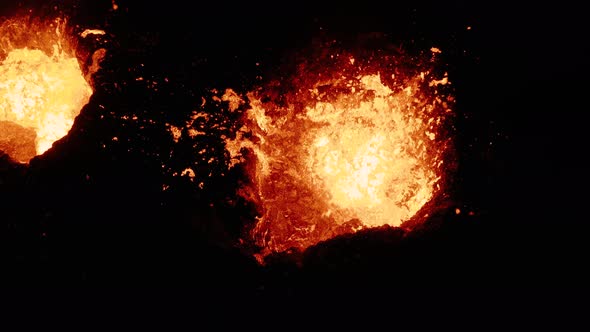Molten magma exploding from crater at Fagradalsfjall volcano, top down ...