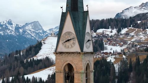 Aerial drone view of the San Lorenzo Church in the Selva di Cadore comune, in the Dolomites, Italy