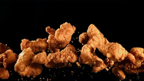 Appetizing Fried Chicken Rising in Slow Motion