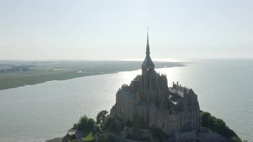 Aerial View Of Historical Mont-Saint-Michel Abbey With Seascape On A Sunny Day In Normandy, France.