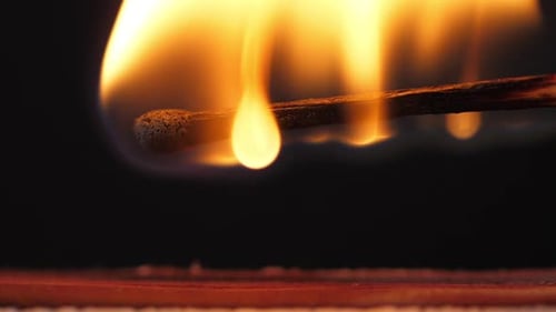 Burning Matchstick in Close Up Detail