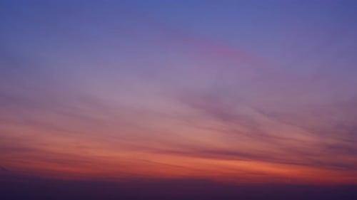 4K sky time lapse of Colorful clouds during the moving sun