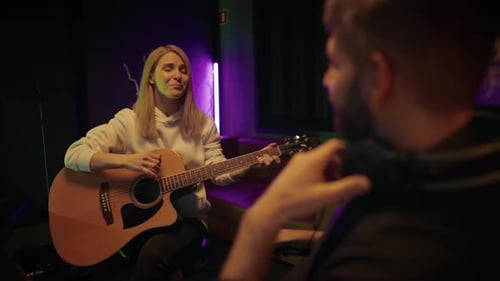 Audition in Recording Studio Talented Lady Guitarist Singing Song and Playing Musical Producer Man