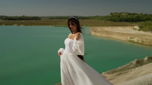 Beautiful Bride Walking Along the Seashore Concept of a Bride on the Beach