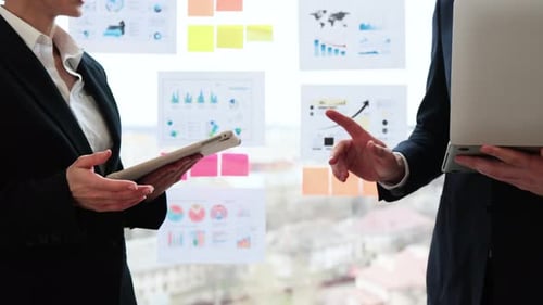 Professional Business Handshake Between Executives in Formal Office Setting