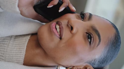 Woman Smiling and Talking on Phone Close-up