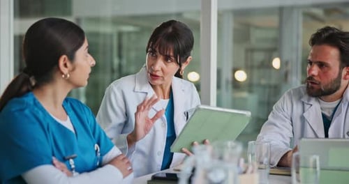 Meeting, team and doctors on tablet in hospital for diagnosis, medical report and patient results