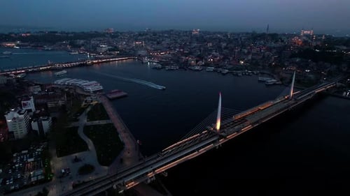 Aerial Istanbul at Night with Illuminated Bridges