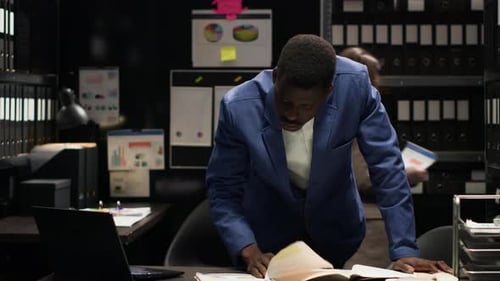 Business People Working at Desks in Office