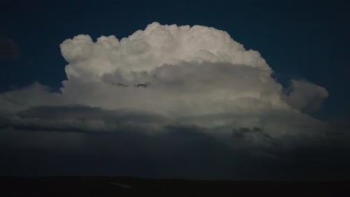Majestic Storm Cloud with Lightning at Night