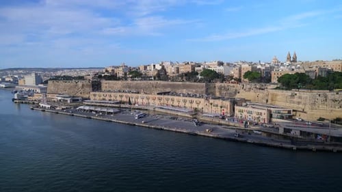 Scenic view of Valletta cruise terminal with historic limestone buildings in Malta