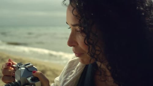Beautiful Lady Taking Photos on Sea Beach. Ethnic Hispanic Woman Using Vintage