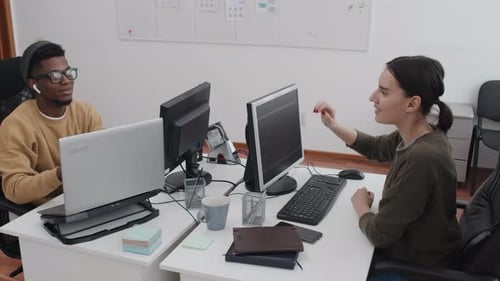 Young Co-workers Doing High Five