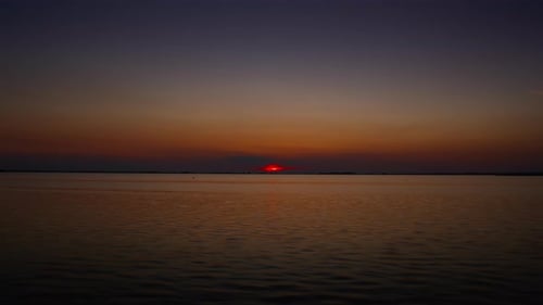 Stunning Sunset Over Tranquil Lake
