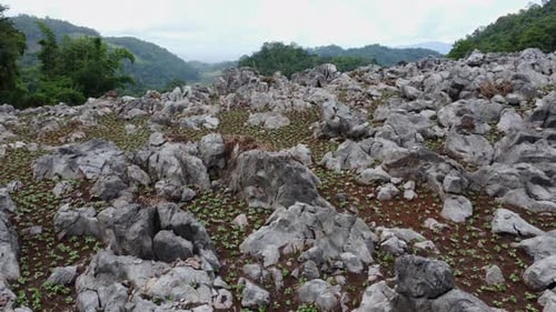 Aerial view of small rocks or sedimentary rock on a cliff in northern Thailand.