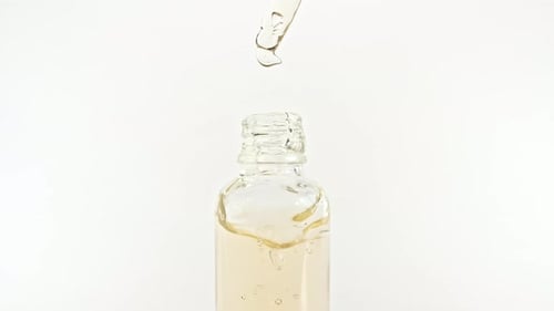 Cosmetic Bottle with Pipette on White Background Cosmetic Spa Medical Skin Care Advertising of a