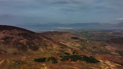 Killarney, Kerry, Ireland, March 2022. Drone tracks north above Lough Caragh while facing west towar