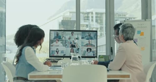 Team Having a Video Conference in Office