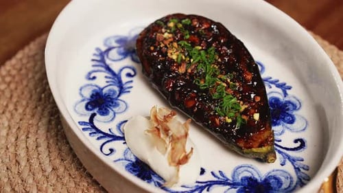 Delicious Glazed Eggplant Displayed on a Decorative Plate