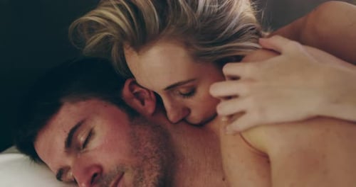 Loving Couple Embrace in Warm Indoor Setting