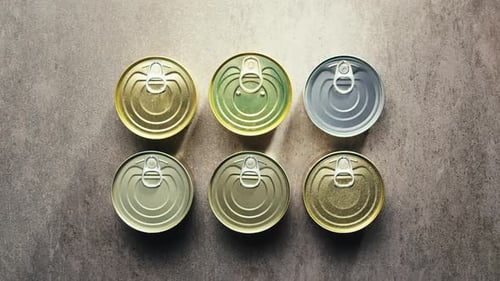 Metal Cans with Canned Food or Pate Top View Golden and Silver Cans with Pull Rings Canned Tourist