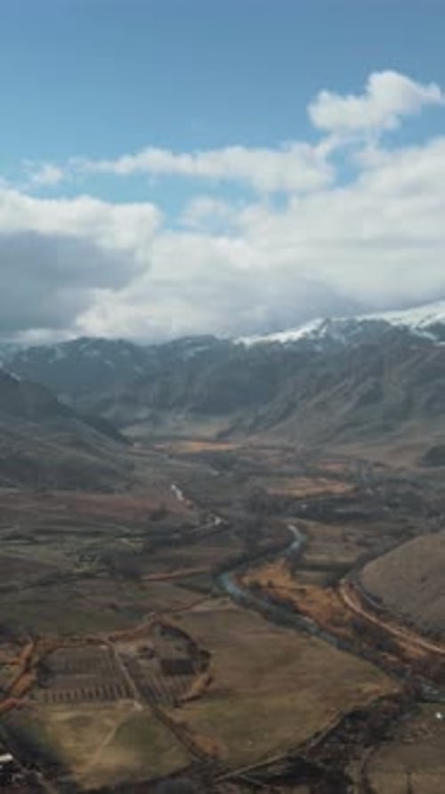 Serene Aerial View of Mountains and Fields Droned Mapping of Agricultural Landscapes and Snowy