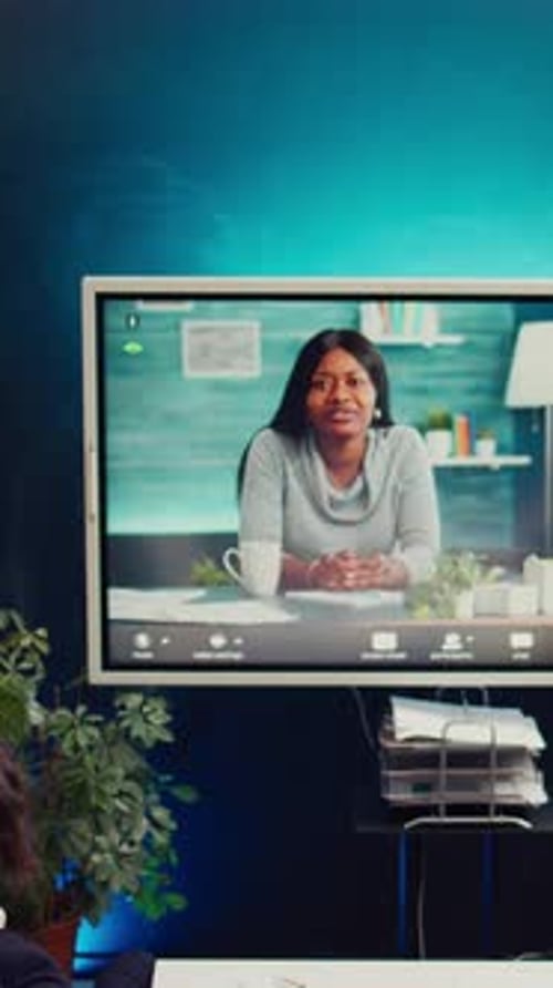 Team Meets via Video Conference Technology