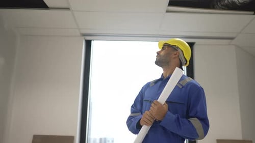 Engineer is working at tower.