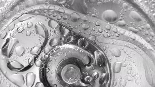 A close-up view of a beverage can's top.