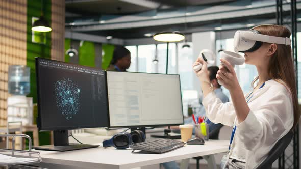 Female Technician Wearing VR Goggles Coding with AI Language Model ...