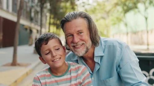 Father and Son Bond on City Bench