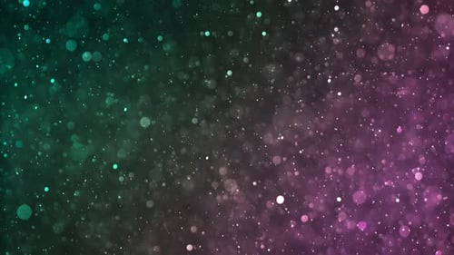 Glittering Particles Floating on Green and Pink Gradient