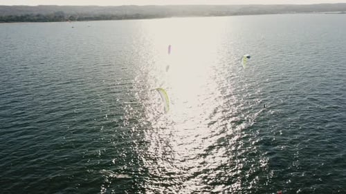 Group of Kite Surfers Doing Tricks in the Baltic Sea at Sunset Gdansk Poland