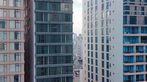 Urban High Rise Buildings Stand Close Together in Modern City Captured By Drone Aerial Shot Urban