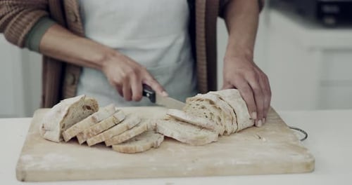 Bread, knife and hands of person in kitchen, bakery or restaurant for meal prep