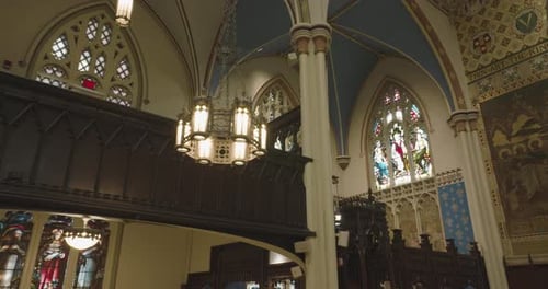 Inside The Medieval Cathedral With Stained Glass Windows. Aerial Drone Shot
