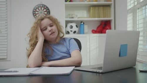 Tired School Child Using Laptop for Study Tired Child Upset By School Tired School Kid Studying at