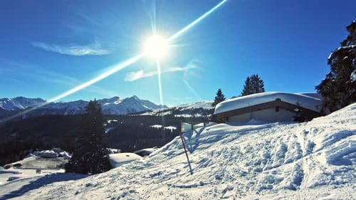 Scenic view of huts roof covered with snow.