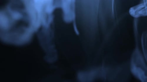 Blue Smoke Cloud in Dark Background