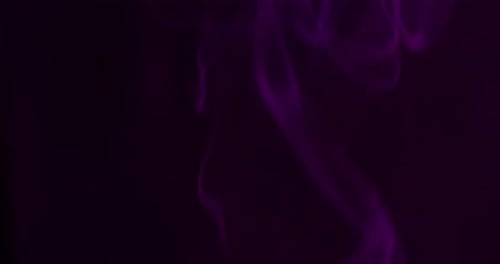 Abstract Purple Smoke on Dark Background